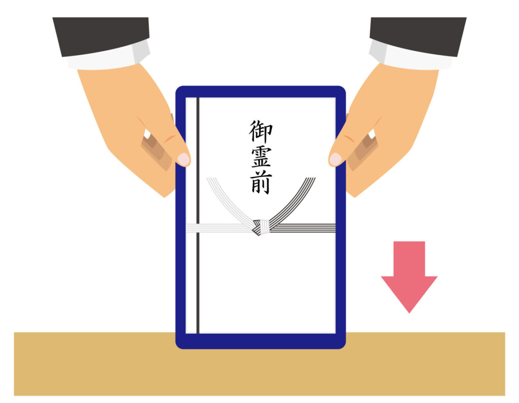 香典袋を渡すイラスト